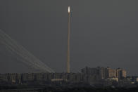 FILE - Rockets are launched from the Gaza Strip towards Israel are seen from Israeli side of the border, Sunday, Aug. 7, 2022. Close to one-third of the Palestinians who died in the latest outbreak of violence between Israel and Gaza militants may have been killed by errant rockets fired by Islamic Jihad fighters, according to an Israeli military assessment that appears consistent with independent reporting by The Associated Press. (AP Photo/Ariel Schalit, File)