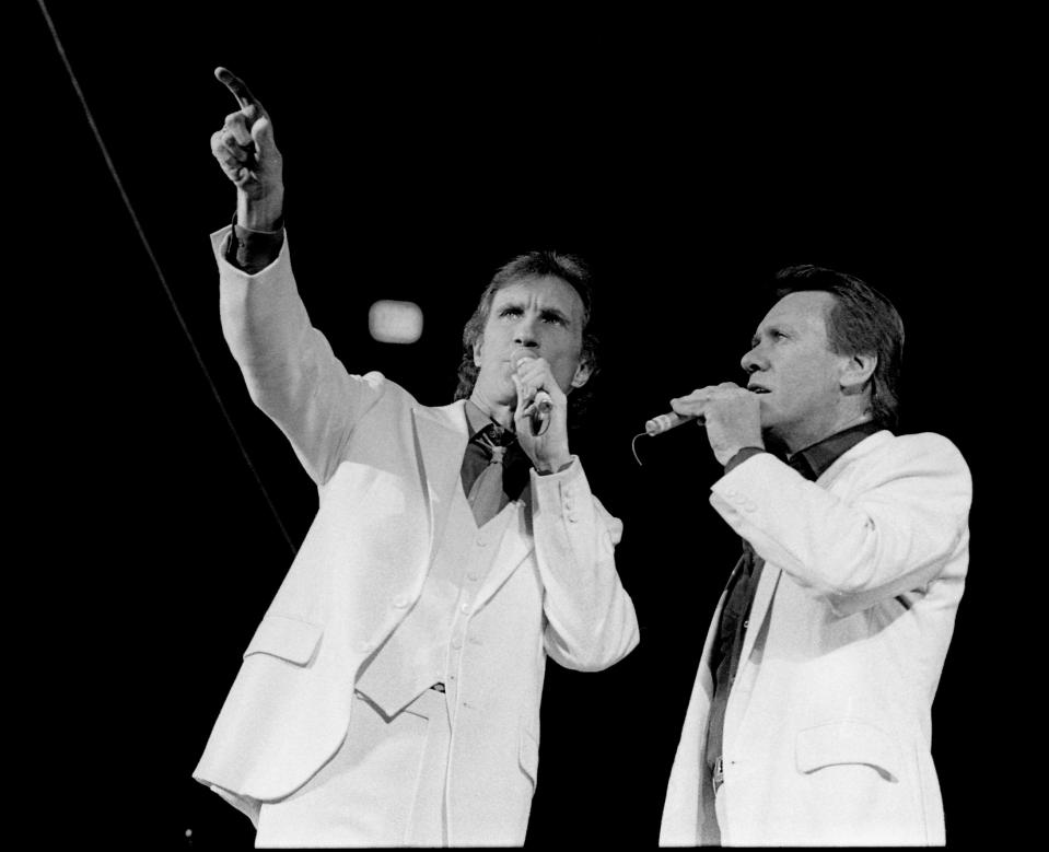 Billy Medley, left, and Bobby Hatfield of the Righteous Brothers are performing during the sold-out concert at the Municipal Auditorium on Nov. 5, 1983. They along with B.J. Thomas and headliner Kenny Rogers make the concert a true Middle America musical “event.”