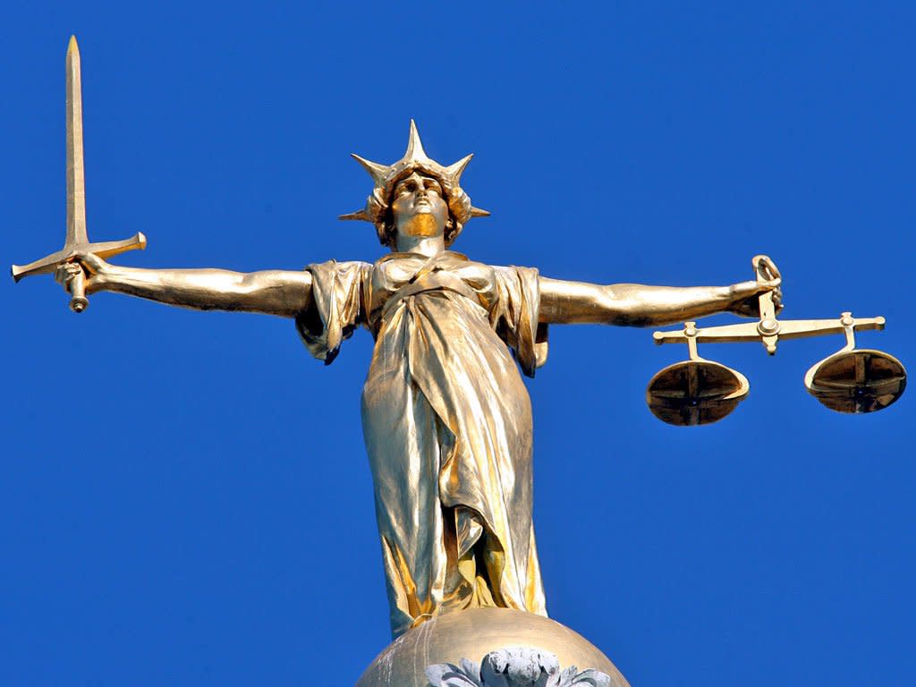 The Scales of Justice above the Old Bailey: Rex Features