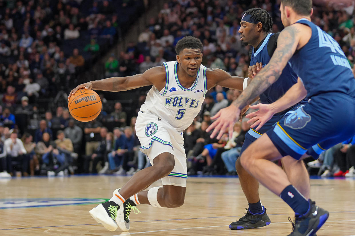 Jan 18, 2024; Minneapolis, Minnesota, USA; Minnesota Timberwolves guard Anthony Edwards (5) dribbles against the Memphis Grizzlies in the second quarter at Target Center. Mandatory Credit: Brad Rempel-USA TODAY Sports