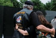 People visit the Vietnam Veterans Memorial on Memorial Day holiday in Washington