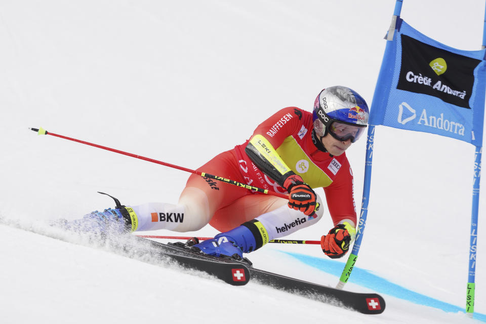 Switzerland's Marco Odermatt speeds down the course during a men's World Cup giant slalom race, in Soldeu, Andorra, Saturday, March 18, 2023. (AP Photo/Giovanni Zenoni)