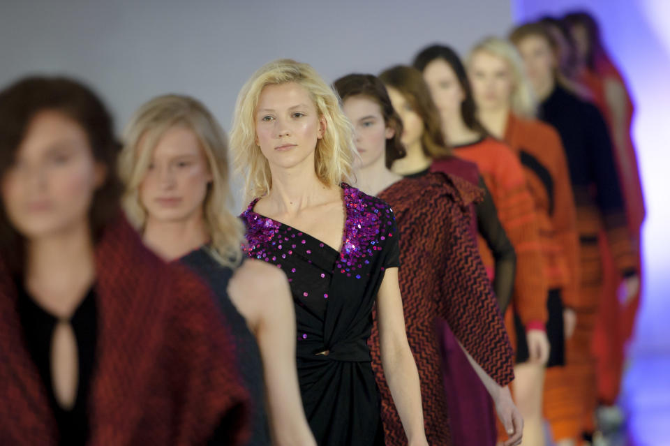 Models wear a design created by Mark Fast during London Fashion Week Autumn/Winter 2014, at Somerset House in central London, Friday, Feb. 14, 2014. (Photo by Jonathan Short/Invision/AP)