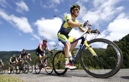 Tinkoff-Saxo team rider Michael Rogers (L) of Australia leads a breakaway as he climbs to the Port de Bales pass during the 237.5km 16th stage of the Tour de France cycling race between Carcassonne and Bagneres-de-Luchon, July 22, 2014. REUTERS/Jacky Naegelen