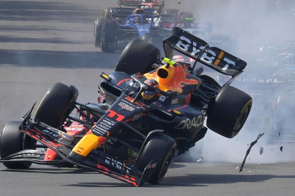Sergio Perez crashes out in Mexico (AFP via Getty Images)