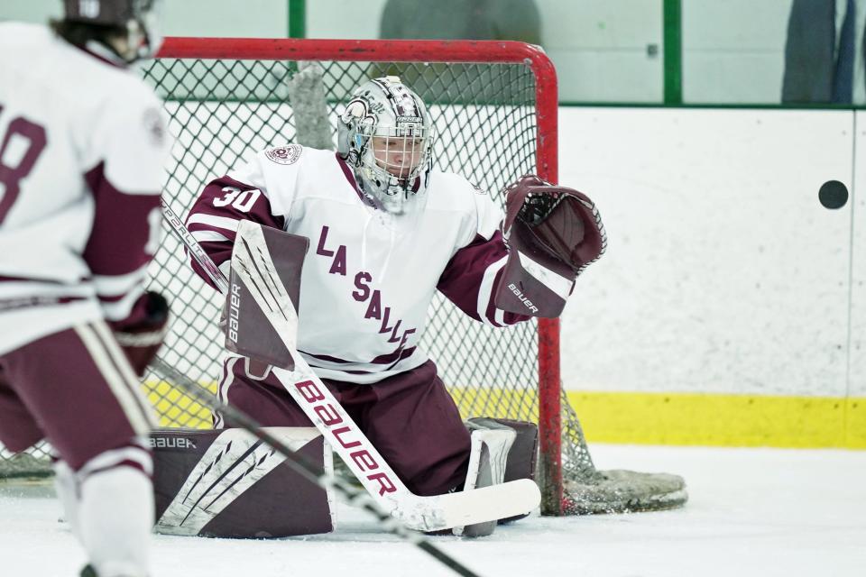 La Salle goalie Michael Corrigan keeps his eye on the puck just before making a save in the first period of Friday's 9-0 win over North Kingstown.