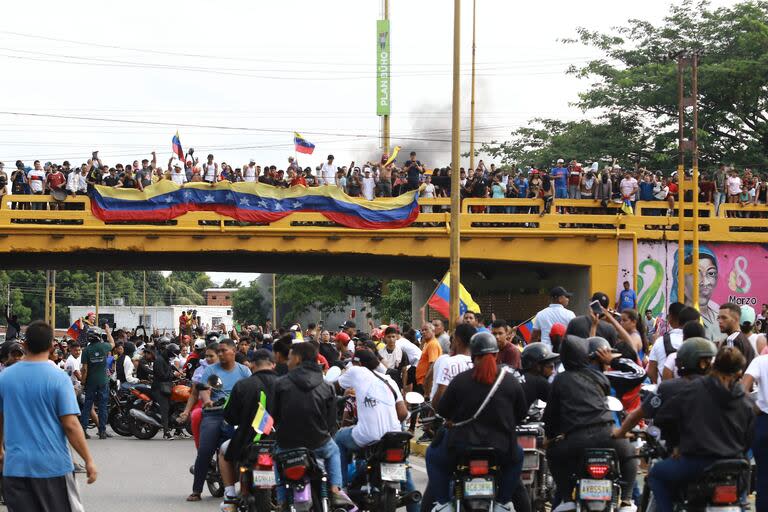 Protestas contra el gobierno venezolano en el estado de Carabobo. (Juan Carlos HERNANDEZ / AFP)