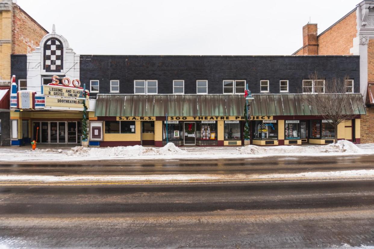 The outside of the Soo Theatre building, which is almost 100 years old. The theater was constructed in 1930 and has undergone many changes and alterations over the years.