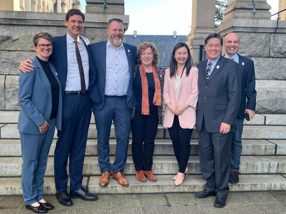 North Coast MLA Jennifer Rice, Premier David Eby, Terrace mayor Sean Bujtas, Smithers mayor Glady Atrill, Municipal Affairs Minister Anne Kang, Prince Rupert mayor Herb Pond, and Stikine MLA Nathan Cullen at the B.C. Legislature on Feb. 22, 2024.