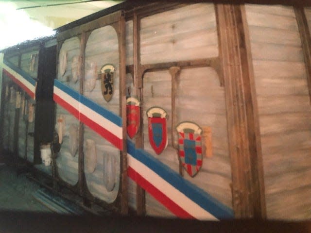 The merci train boxcar after its restoration. It now resides at the Museum of Work & Culture in Woonsocket.