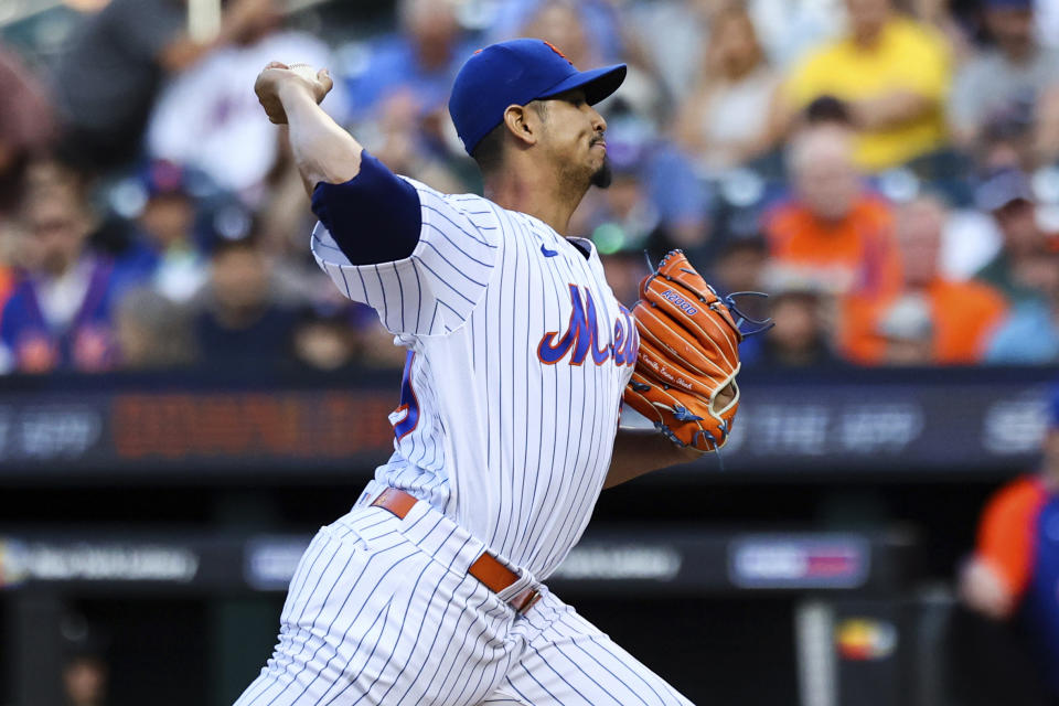 New York Mets starting pitcher Carlos Carrasco throws to a Houston Astros batter during the first inning of a baseball game Tuesday, June 28, 2022, in New York. (AP Photo/Jessie Alcheh)