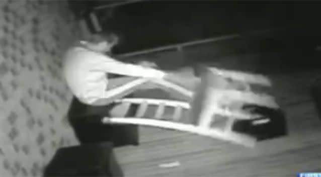 The moment he begins to throw furniture around the residence. Source: 7 News.