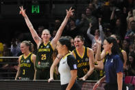 Australian's Lauren Jackson and Cayla George react from the bench during their game at the women's Basketball World Cup against Canada in Sydney, Australia, Monday, Sept. 26, 2022. (AP Photo/Mark Baker)