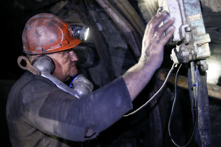 Mining engineer Volodymyr Matyukh works inside the Novovolynska-9 coal mine in Novovolynsk, Ukraine August 2, 2018. Picture taken August 2, 2018. REUTERS/Valentyn Ogirenko