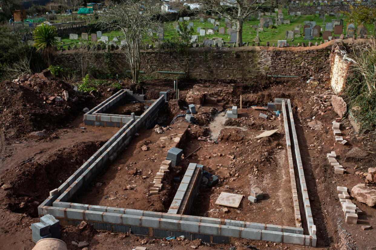 The site of a medieval bishop's palace has been unearthed in Wiveliscombe during building work on a bungalow. The discovery of the important remains was made on the land of Charles Pole as he was having building work done on a new bungalow. Wiveliscombe, Somerset. 10 March 2021.  See SWNS story SWBRpalace. An OAP building a bungalow in his garden uncovered the remains of a long lost PALACE - solving a centuries-old mystery. Retired banker Charles Pole, 81, had hoped to move into the one-storey home and sell his house. But that is all on hold and he says he is facing a 15K bill after a 700-year-old Bishop's Palace was found under his lawn. The ancient building dates from the 13th Century and was in ruins by the 18th Century and then disappeared.
