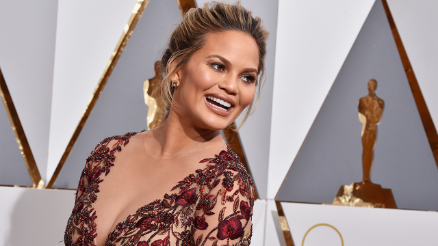 Chrissy Teigen suffers nip slip at John Legend concert - Swimsuit