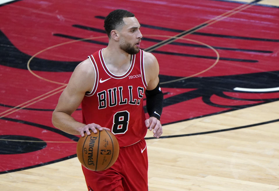 Feb 20, 2021; Chicago, Illinois, USA; Chicago Bulls guard Zach LaVine (8) dribbles the ball against the Sacramento Kings during the second quarter at the United Center.