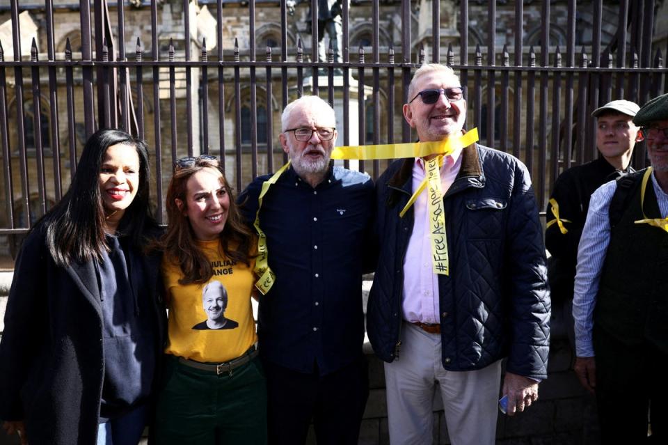 Stella Moris, wife of WikiLeaks founder Julian Assange, and Jeremy Corbyn attend a protest outside the Houses of Parliament (REUTERS)