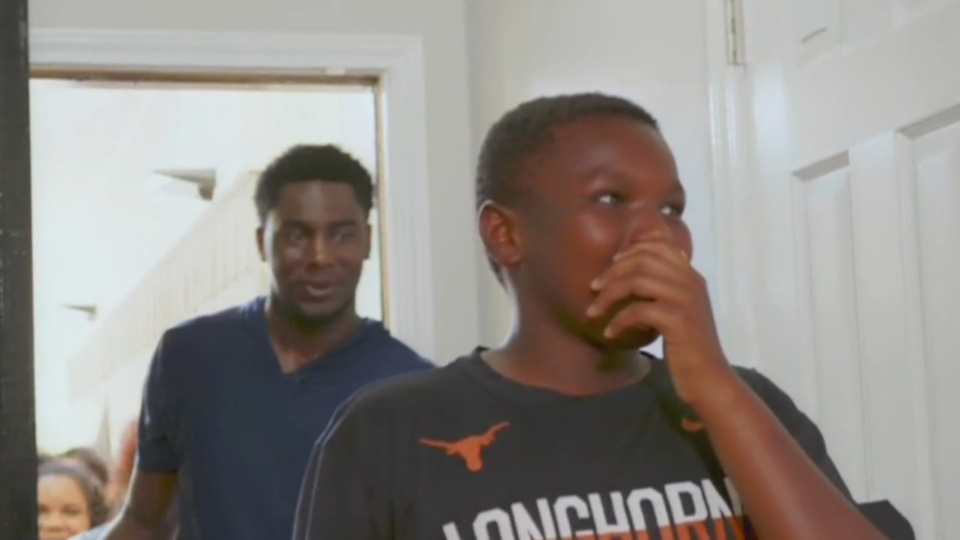 The brothers walk into their renovated home for the first time.  / Credit: CBS News