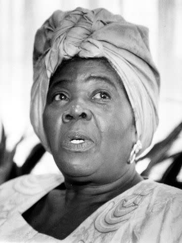 <p>Boris Spremo/Toronto Star/Getty</p> Cedella Booker at a ceremony at Toronto city hall on May 6, 1992 to proclaim Bob Marley Day.