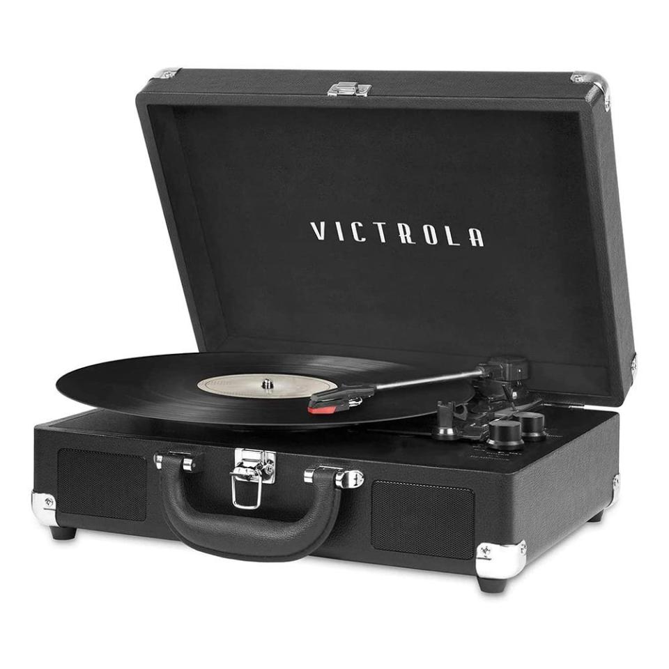 <p><strong>Victrola</strong></p><p>amazon.com</p><p><strong>$53.88</strong></p><p><a href="https://www.amazon.com/dp/B00UMVW4VA?tag=syn-yahoo-20&ascsubtag=%5Bartid%7C2089.g.34239500%5Bsrc%7Cyahoo-us" rel="nofollow noopener" target="_blank" data-ylk="slk:Shop Now;elm:context_link;itc:0;sec:content-canvas" class="link ">Shop Now</a></p><p>Whether he wants to visit his musical past or just wants to get into vinyl because it’s having a moment, this record player is the perfect way to get (back) into the hobby. Excellent speaker quality means they’ll hear the songs the way they were meant to be heard (analog, baby!), and Bluetooth capability means they can stream their digital music as well.</p>