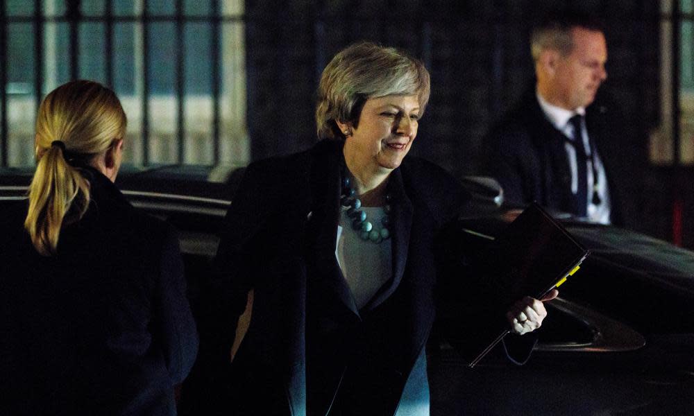 Theresa May arrives at No 10 Downing Street after making her statement to the House of Commons.