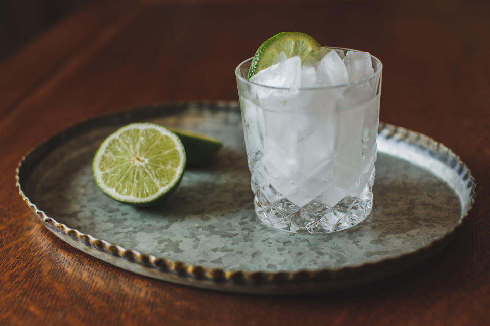 A gin and tonic on a tray