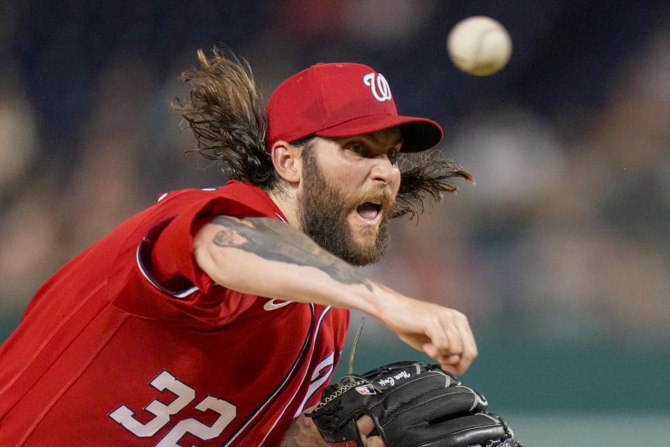 Washington Nationals starting pitcher Trevor Williams throws during the first inning of a baseball game against the Colorado Rockies at Nationals Park, Tuesday, July 25, 2023, in Washington. (AP Photo/Alex Brandon)