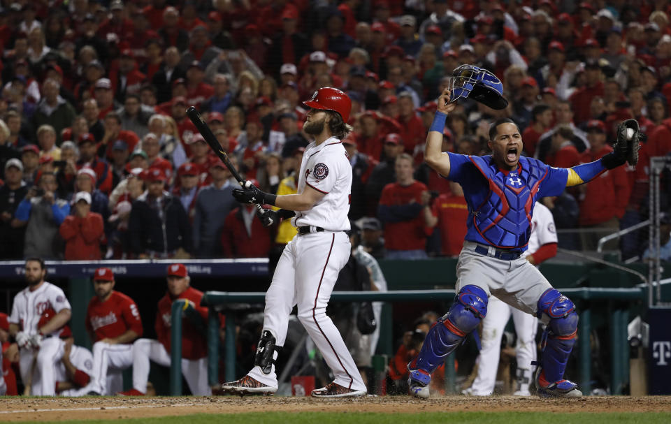 Cubs catcher Willson Contreras begins to celebrate after the Nationals’ Bryce Harper struck out swinging in the ninth inning. (AP)