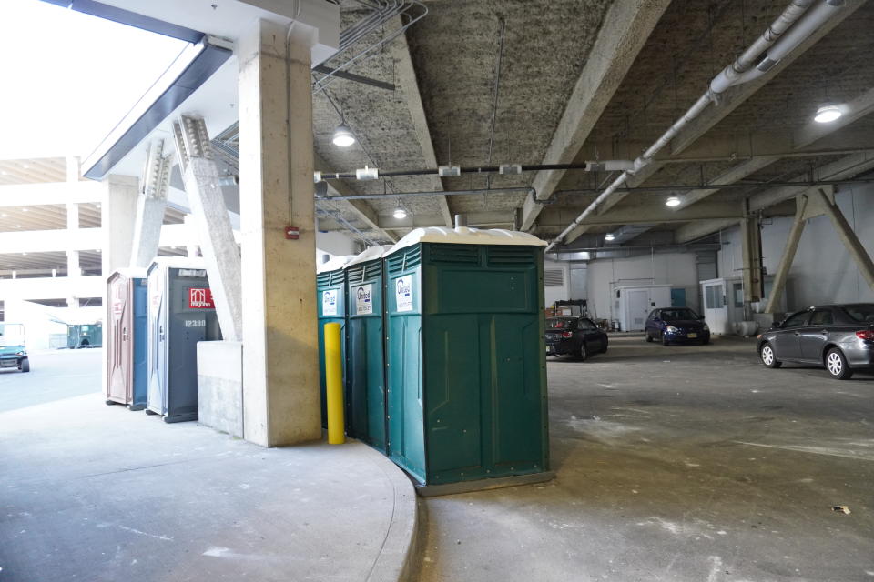 American Dream doesn't earn high marks for first impressions. Porta-potties for the construction workers punctuate the exterior. 