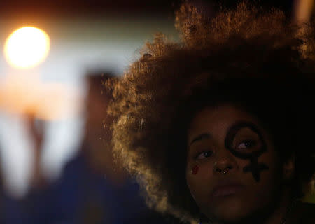 A woman attends a protest against rape and violence against women in Rio de Janeiro, Brazil, May 27, 2016. REUTERS/Ricardo Moraes