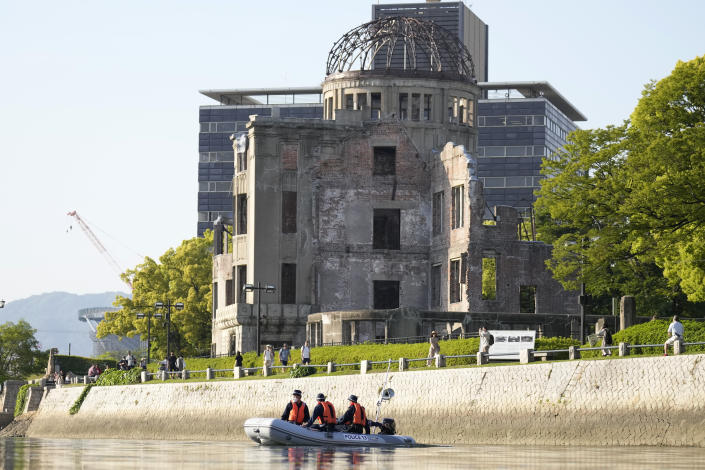 FILE - Police officers patrol on the river near the famed Atomic Bomb Dome as Japan's police beef up security ahead of the Group of Seven nations' meetings in Hiroshima, western Japan on May 17, 2023. Leaders of seven of the world’s most powerful democracies will gather this weekend for the Group of Seven summit in Hiroshima, the location of the world’s first atomic attack at the end of World War II. The leaders are expected to strongly condemn Russia’s war on Ukraine while pledging their continuing support for Ukraine. (AP Photo/Eugene Hoshiko, File)