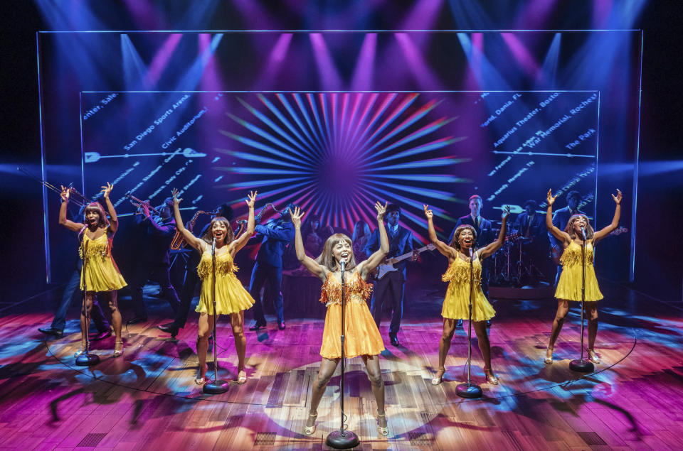 This image released by Polk & Co. shows Adrienne Warren, center, during a performance of "Tina: The Tina Turner Musical." Nominations for Tony Awards will be announced Thursday with just 18 eligible plays and musicals making the cut, a fraction of the 34 shows the season before. (Manuel Harlan/Polk & Co. via AP)