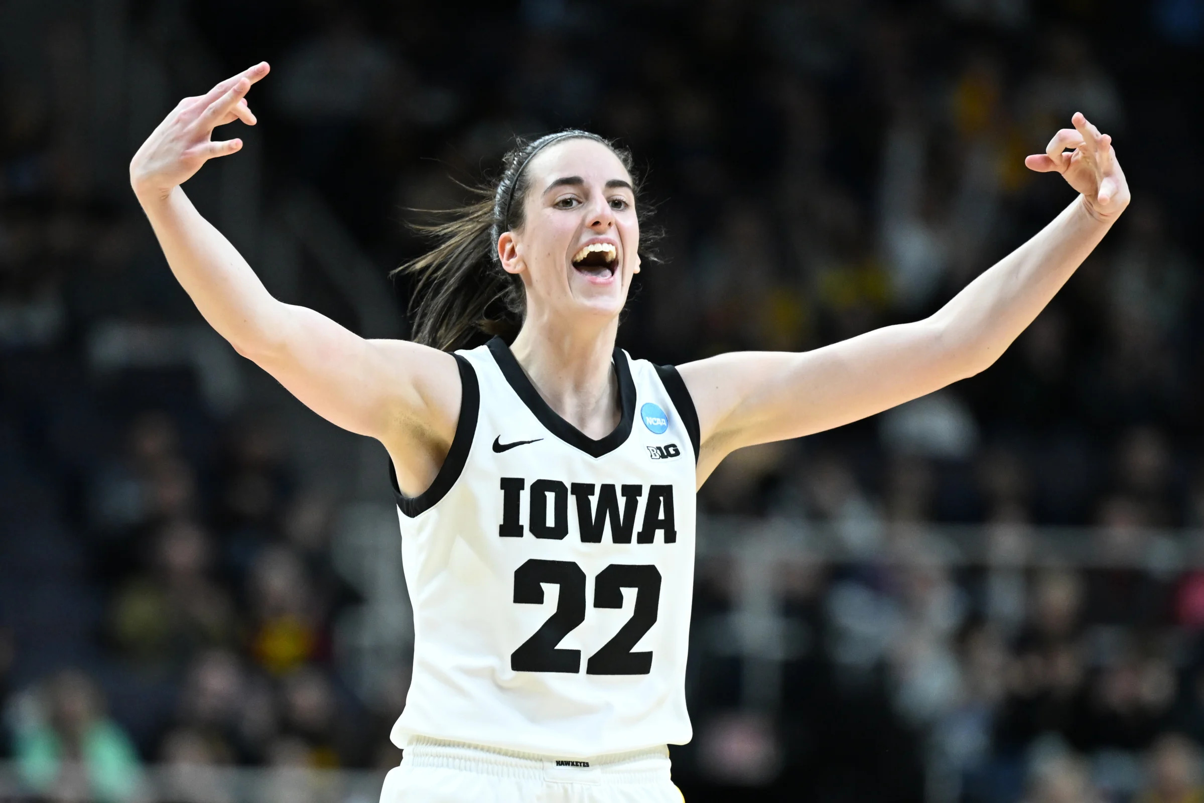 Iowa's Caitlin Clark reacts after a 3-pointer against the Colorado Buffaloes during the Sweet 16 on Saturday. (Greg Fiume/Getty Images)
