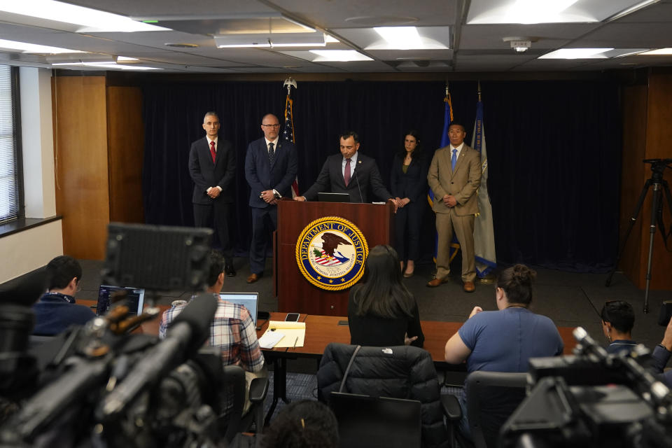 U.S. Attorney Martin Estrada, center, announces charges against the former longtime interpreter for Los Angeles Dodgers star Shohei Ohtani during a news conference Thursday, April 11, 2024, in Los Angeles. Ippei Mizuhara is being charged with federal bank fraud for crimes involving gambling debts and theft of millions of dollars from the Japanese sensation, federal authorities said. (AP Photo/Ryan Sun)