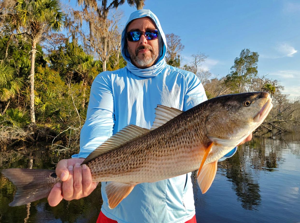 Jay Pink, of Brooksville, caught this 27-inch redfish on a live shrimp while fishing at Yankeetown with Capt. Marrio Castello, of Tall Tales Charters this week. 