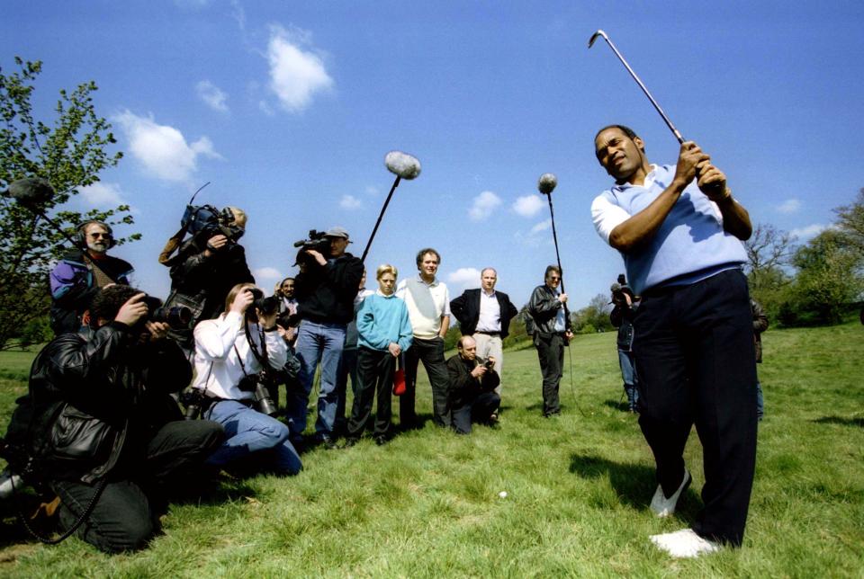 Former American football star OJ Simpson is surrounded by the media as he plays a round of golf at a club in Surrey May 12. Simpson is in Britain for a live TV interview on Monday and will speak to students at the Oxford Union the following day.

BRITAIN SIMPSON