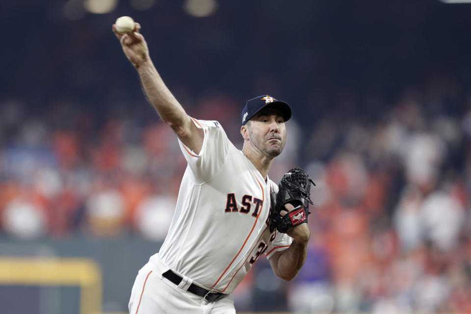 Houston Astros starting pitcher Justin Verlander (35) delivers a pitch against the Tampa Bay Rays in the first inning during Game 1 of a best-of-five American League Division Series baseball game in Houston, Friday, Oct. 4, 2019. (AP Photo/Michael Wyke)