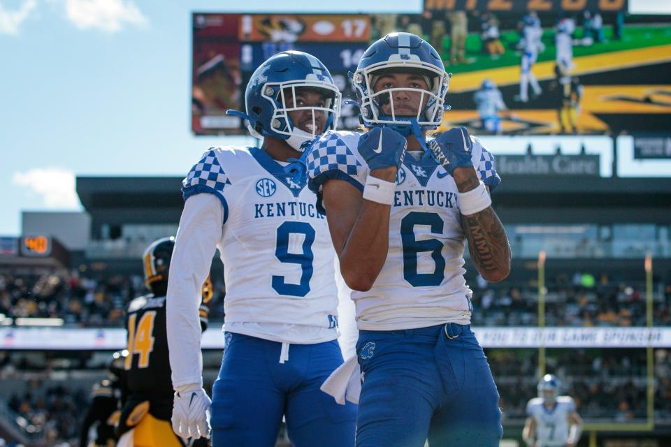 Nov 5, 2022; Columbia, Missouri, USA; Kentucky Wildcats wide receiver Dane Key (6) and Kentucky Wildcats wide receiver Tayvion Robinson (9) celebrate in the end zone after a touchdown during the fourth quarter against the Missouri Tigers at Faurot Field at Memorial Stadium. Mandatory Credit: William Purnell-USA TODAY Sports