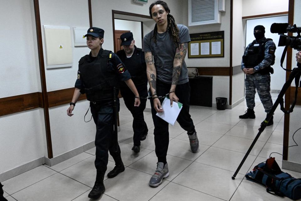 US Women's National Basketball Association (WNBA) basketball player Brittney Griner, who was detained at Moscow's Sheremetyevo airport and later charged with illegal possession of cannabis, leaves the courtroom after the court's verdict in Khimki outside Moscow, on August 4, 2022 (AFP via Getty Images)