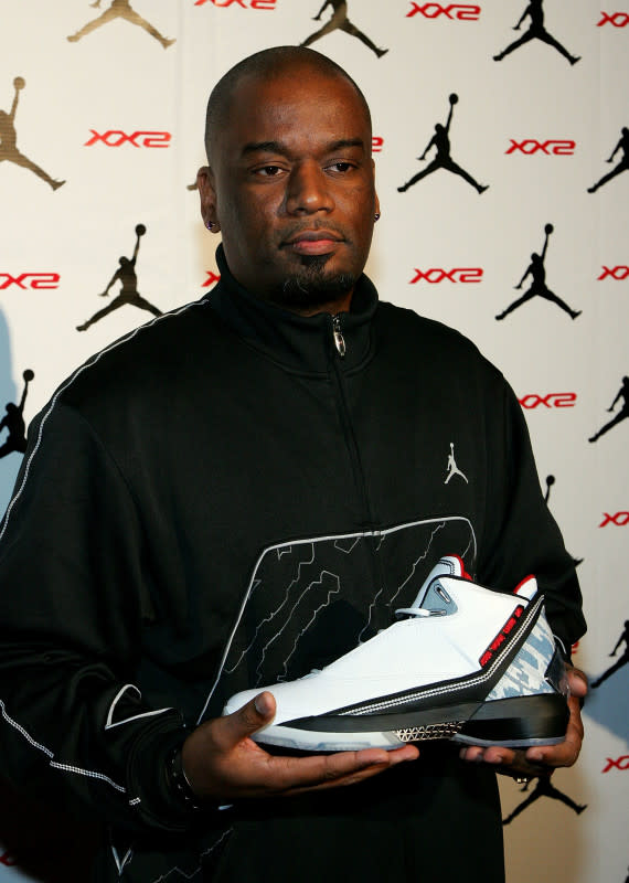 Edwards in 2007, celebrating the launch of the Air Jordan XX2, which <a href="https://www.footlocker.com/history-of-air-jordan.html#:%7e:text=D'Wayne%20Edwards%20returned%20for,of%20the%20game's%20greatest%20player." rel="nofollow noopener" target="_blank" data-ylk="slk:he designed.;elm:context_link;itc:0;sec:content-canvas" class="link ">he designed.</a><p>Photo: Ethan Miller/Getty Images</p>