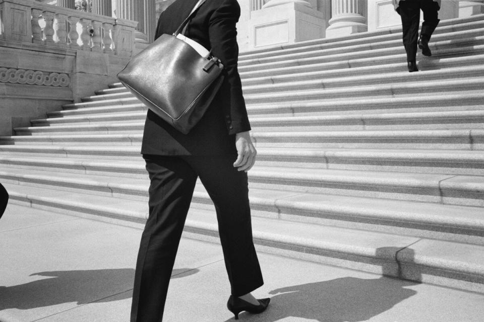 Hillary walks up the steps of the US Capitol to meet with Senate leaders. May 16, 2006.