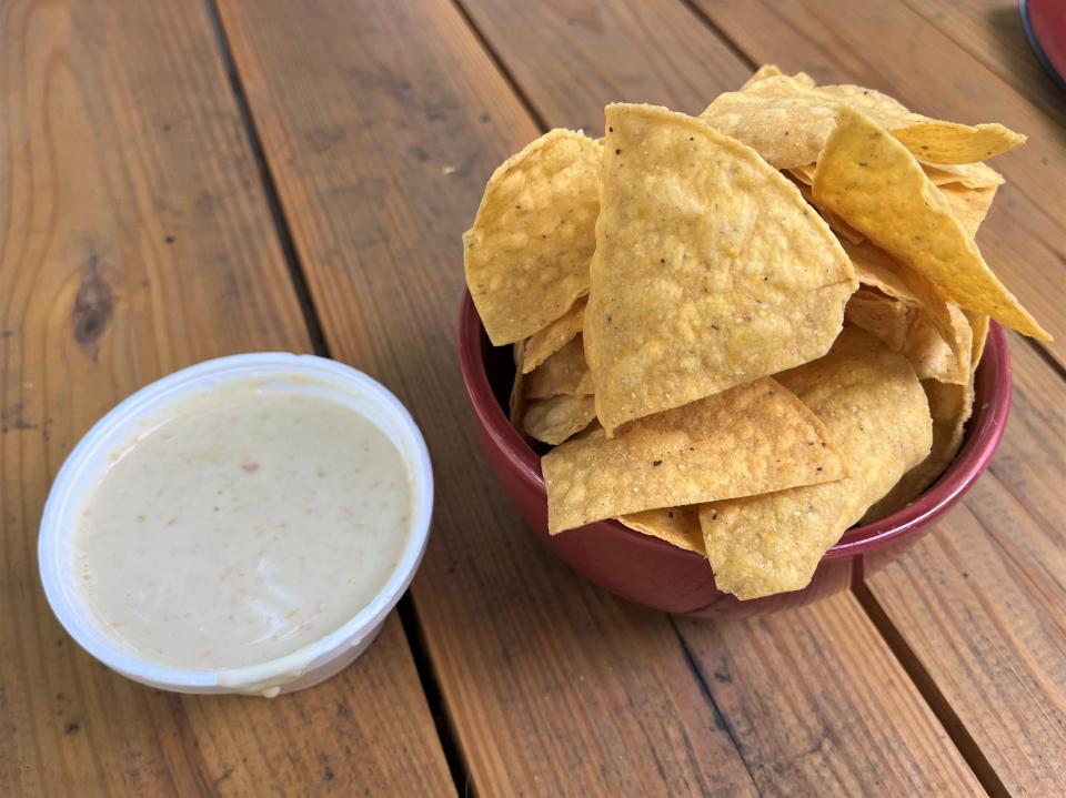 Warm chips and house-made queso is a great way to get started when visiting Locos Taco.