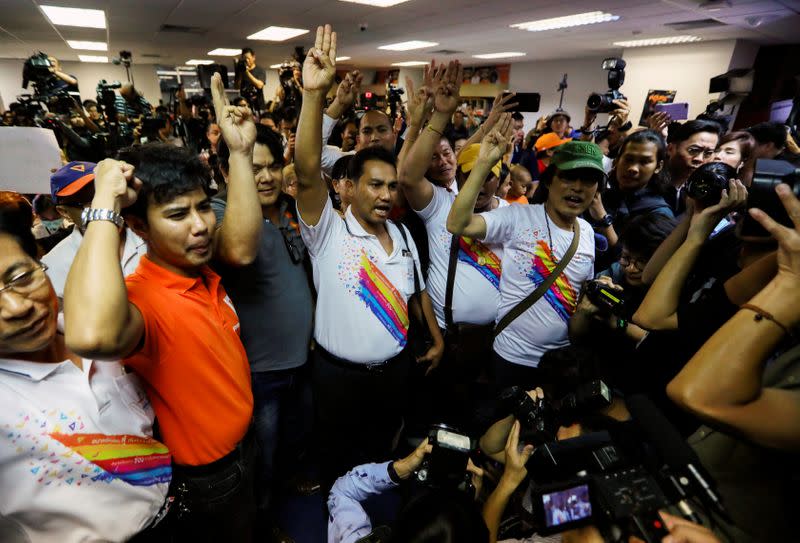 Supporters of Future Forward Party shout after Thailand's Constitutional Court ruled that key figures of the opposition Future Forward Party were not guilty of opposing the monarchy, at the party's headquarters in Bangkok