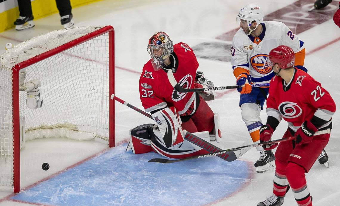 Carolina Hurricanes goalie Antii Raanta (32) lets a shot by New York Islanders’ Ryan Pulock (6) gets past him in the second period on Tuesday, April 17, 2023 at PNC Arena in Raleigh, N.C.