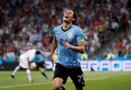 Soccer Football - World Cup - Round of 16 - Uruguay vs Portugal - Fisht Stadium, Sochi, Russia - June 30, 2018 Uruguay's Edinson Cavani celebrates scoring their first goal. REUTERS/Jorge Silva