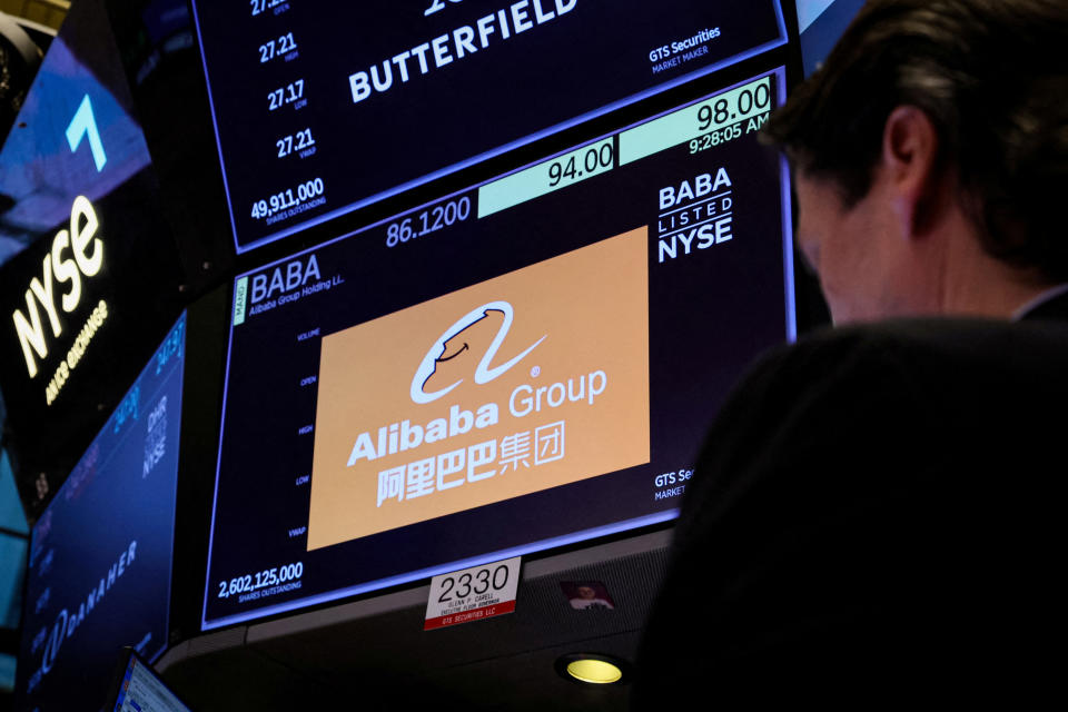 Trader works at the post where Alibaba is traded on the floor of the New York Stock Exchange (NYSE) in New York City, U.S., March 28, 2023.  REUTERS/Brendan McDermid