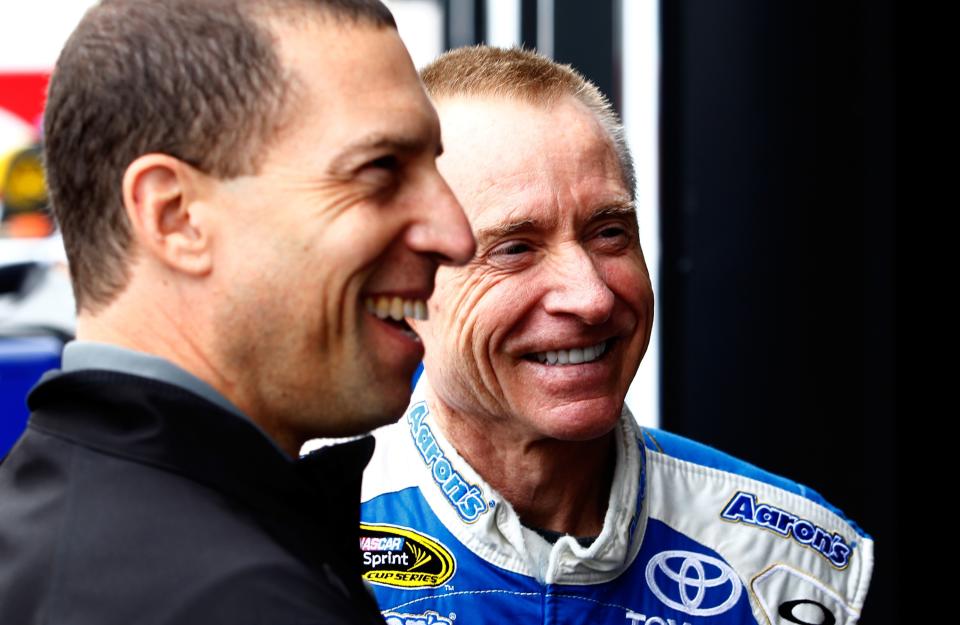 Rob Kauffman (L) is a former co-owner of Michael Waltrip Racing and the chairman of the RTA. (Getty Images)