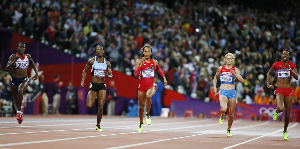 Sanya Richards-Ross (C) of the U.S. runs to win the gold medal in the women's 400m final during the London 2012 Olympic Games at the Olympic Stadium August 5, 2012. From left, the runners are: Britain's Christine Ohuruogu, who won the silver; Botswana's Amantle Montsho, who finished in fourth place; Ross; Russia's Antonina Krivoshapka, who finished in sixth place and DeeDee Trotter of the U.S., who won the bronze. REUTERS/Lucy Nicholson (BRITAIN - Tags: SPORT ATHLETICS OLYMPICS) 