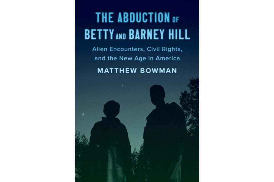 The book cover for The Abduction of Betty and Barney Hill, with silhouettes of two people looking up at the dark night sky.